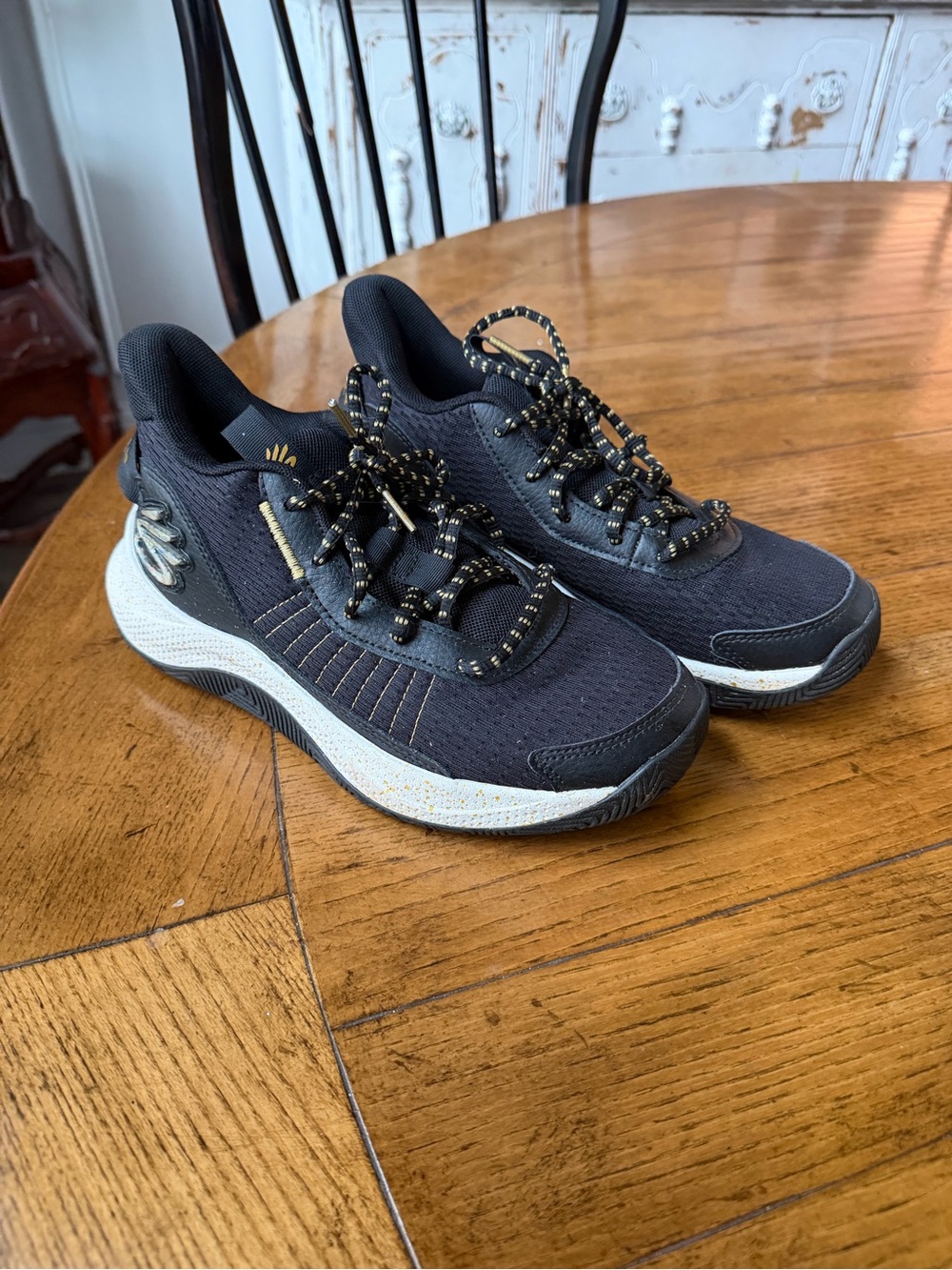Under a Armour Seth Curry Black Athletic Sneakers with Gold Detailing